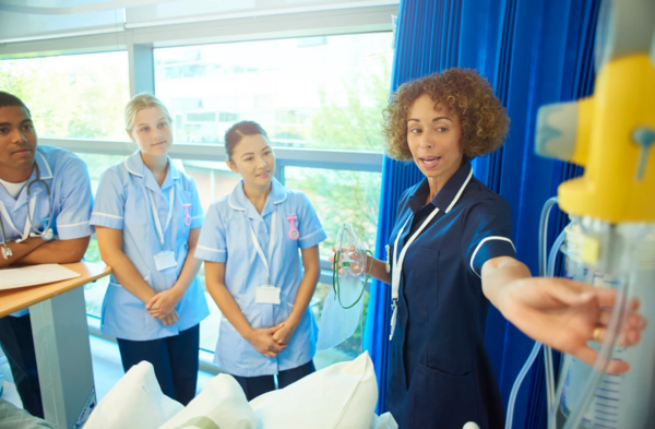 Nursing apprentices being trained in hospital