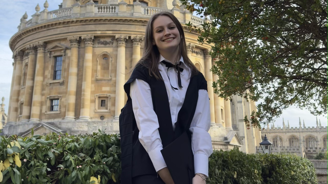 Chloe, University of Oxford student, in campus grounds